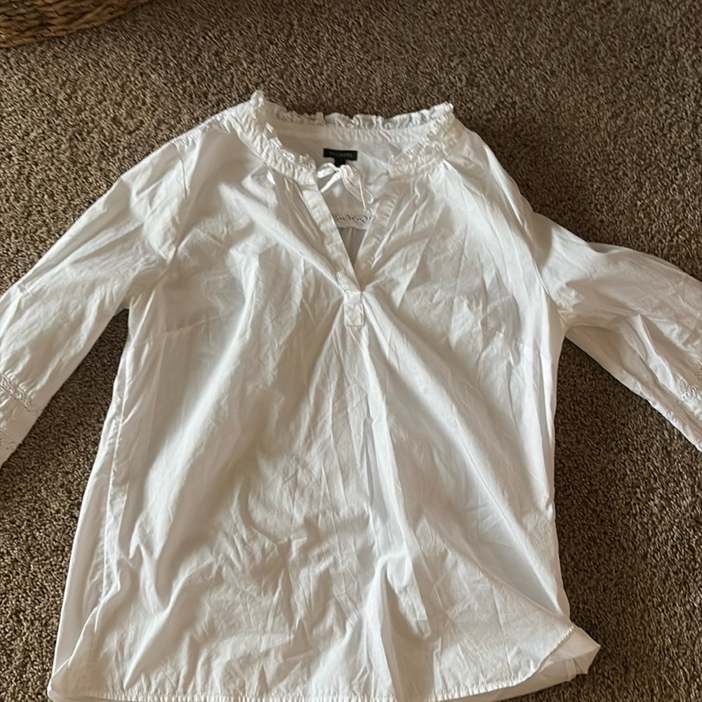 White, long sleeve shirt, good for dressing up occasions